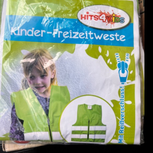 Kinder Warnweste grün, zu finden beim Stand 99 am Standort Flohkids Hamburg Nord