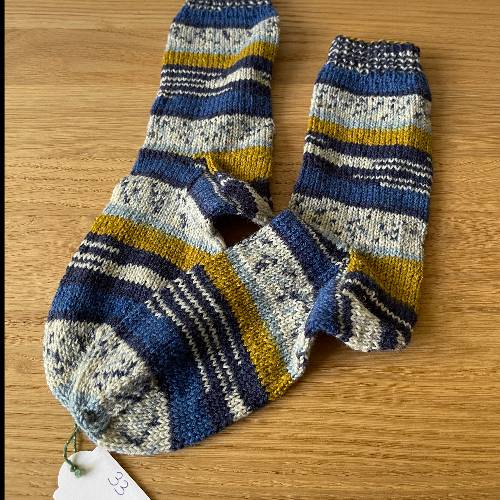 Wollsocken  Größe: 33 blau-gelb-Mix, zu finden beim Stand 31 am Standort Flohkids Hamburg Nord