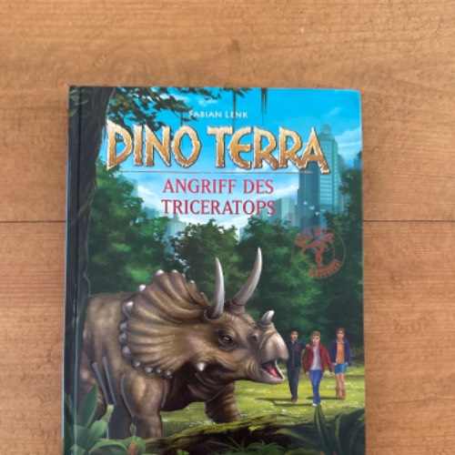 Dino Terra Tricetatops Buch3, zu finden beim Stand 29 am Standort Flohkids Hamburg Nord