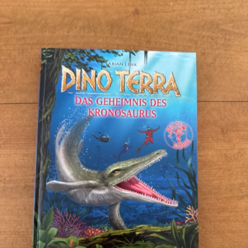 Dino Terra Kronosaurus Buch7, zu finden beim Stand 29 am Standort Flohkids Hamburg Nord