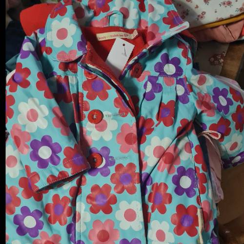 Regenjacke Blume  Größe: 74/80, zu finden beim Stand 102 am Standort Flohkids Hamburg Nord