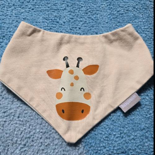 Babydream Lätzchen Giraffe, zu finden beim Stand 141 am Standort Flohkids Hamburg Nord