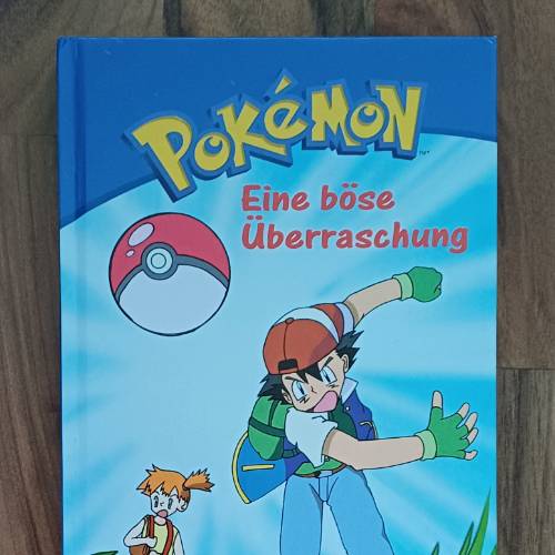 Pokémon Buch Eine böse Überr., zu finden beim Stand 174 am Standort Flohkids Hamburg Nord