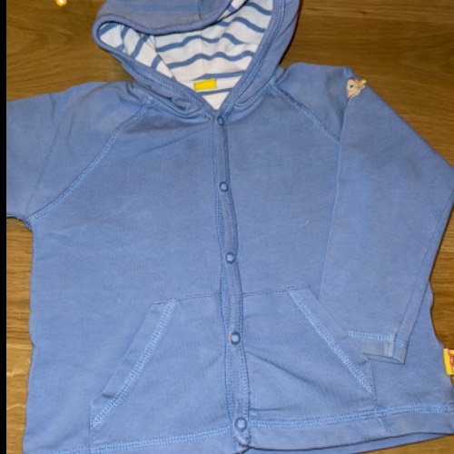 175 Steiff Sweatjacke blau  Größe: 74, zu finden beim Stand 175 am Standort Flohkids Hamburg Nord