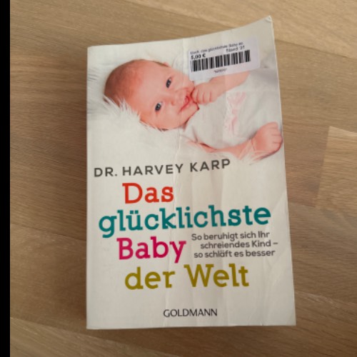 Buch, das glücklichste Baby de, zu finden beim Stand 91 am Standort Flohkids Hamburg Nord